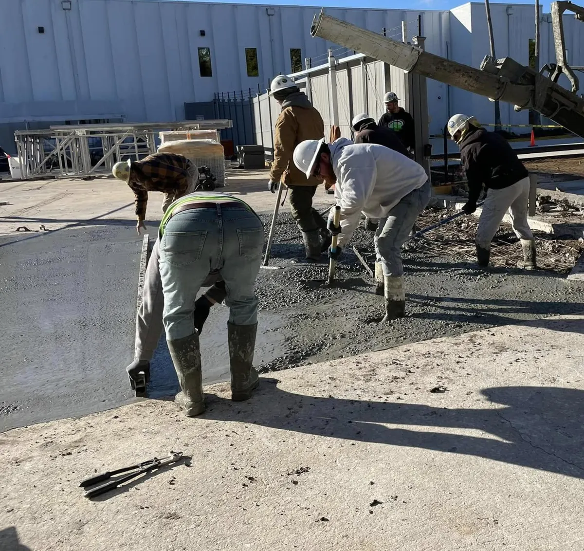 Green Hammer crew pouring a commercial concrete slab